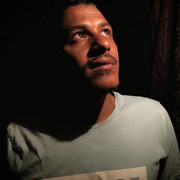 Kaveri Mehta, Lead Design Curator at Marble Novel Ridge, reviewing corporate floral arrangements